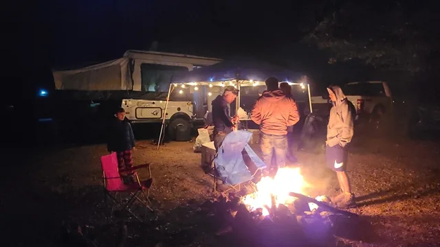 Camping tents and fire at 281 Country Club overnight stay